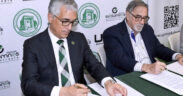 From left: Agustín Rullán-Toro, rector of the University of Puerto Rico, Mayagüez, and alumnus Fernando L. Sumaza-Laborde sign the agreement establishing a new engineering endowment fund.