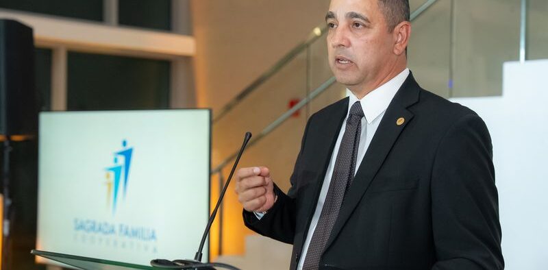 Eddie W. Alicea-Sáez, CEO of Cooperativa La Sagrada Familia, announcing the launch of the $1 million Puerto Rico Coopera community investment fund in Naranjito.