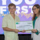 Christian A. Colón Maldonado, a University of Puerto Rico student, receives a $2,500 scholarship from FirstBank as part of the YOU First Scholarship Program.
