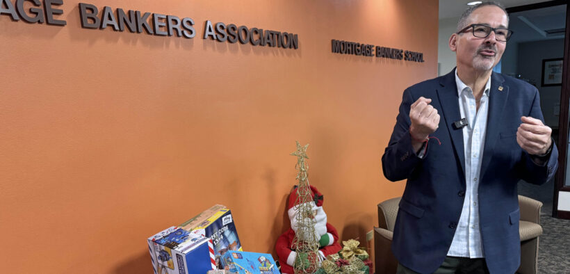 Ricardo Negrón, executive director of the Puerto Rico Mortgage Bankers Association, announces the islandwide “United for children: Give a smile this Christmas” toy-collection campaign.