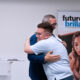 From left: Pedro Toro-Cancio, board vice chair of VAPR Federal Credit Union, and student Yesiel Molina-Ayala share a hug during the scholarship ceremony in San Juan, Puerto Rico.
