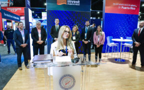 InvestPR CEO Ella Woger-Nieves speaks during a presentation on Puerto Rico’s investment results at an industry event.