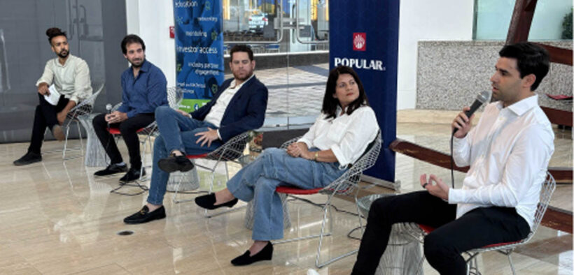 David Geeter, left, moderates a panel discussion with program participants during the Angel Investor Insights Series event in San Juan.