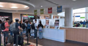 Customers use a self-service food ordering kiosk at Luis Muñoz Marín International Airport.