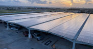 Solar panels installed atop the multi-story parking facility at Luis Muñoz Marín International Airport form part of a $14 million microgrid project designed to improve energy resilience and reduce operating costs.
